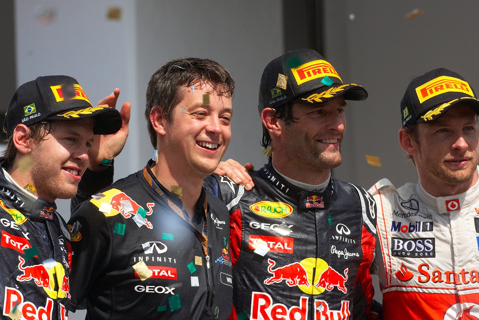 Final podium ceremony group photo of second placed Sebastian Vettel, strategist Will Courtney, race winner Mark Webber (all Red Bull Racing) and third placed Jenson Button of McLaren