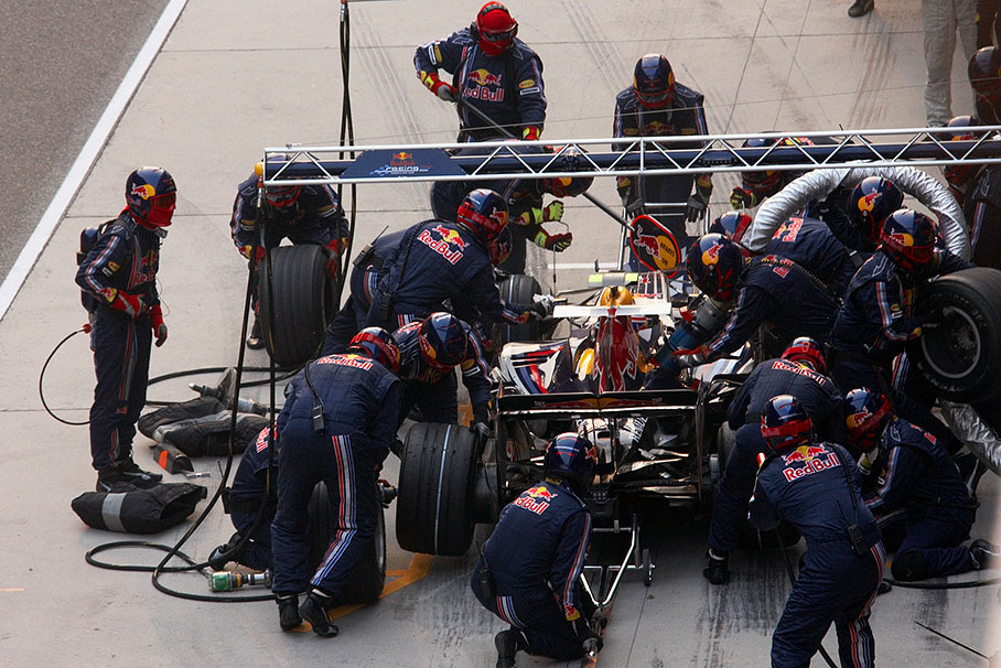 Mark Webber stops at Red Bull Racing pits