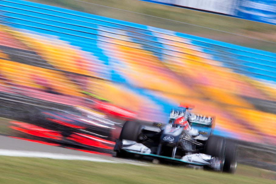 Michael Schumacher, Mercedes GP, gives space to an overtaking Hamilton in a McLaren