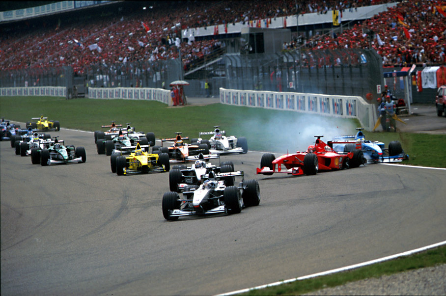 Start incident of Michael Schumacher and a late braking Fisichella
