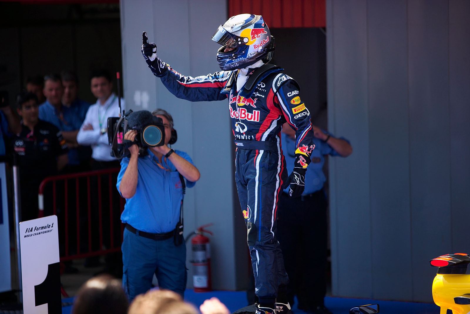 Sheer joy of winner Sebastian Vettel in parc ferme.
