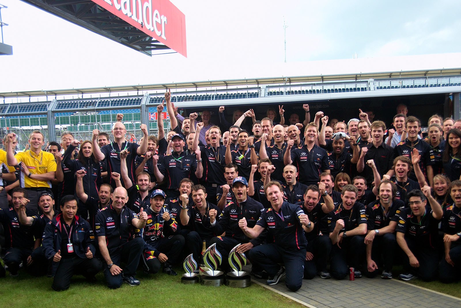 The Red Bull Racing team celebrates their achievement after the race