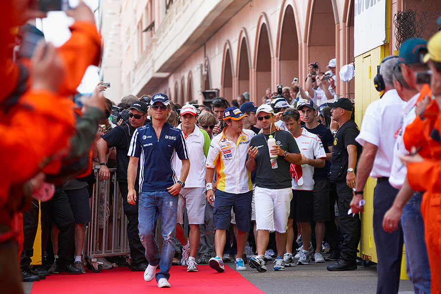 The drivers walk to their parade