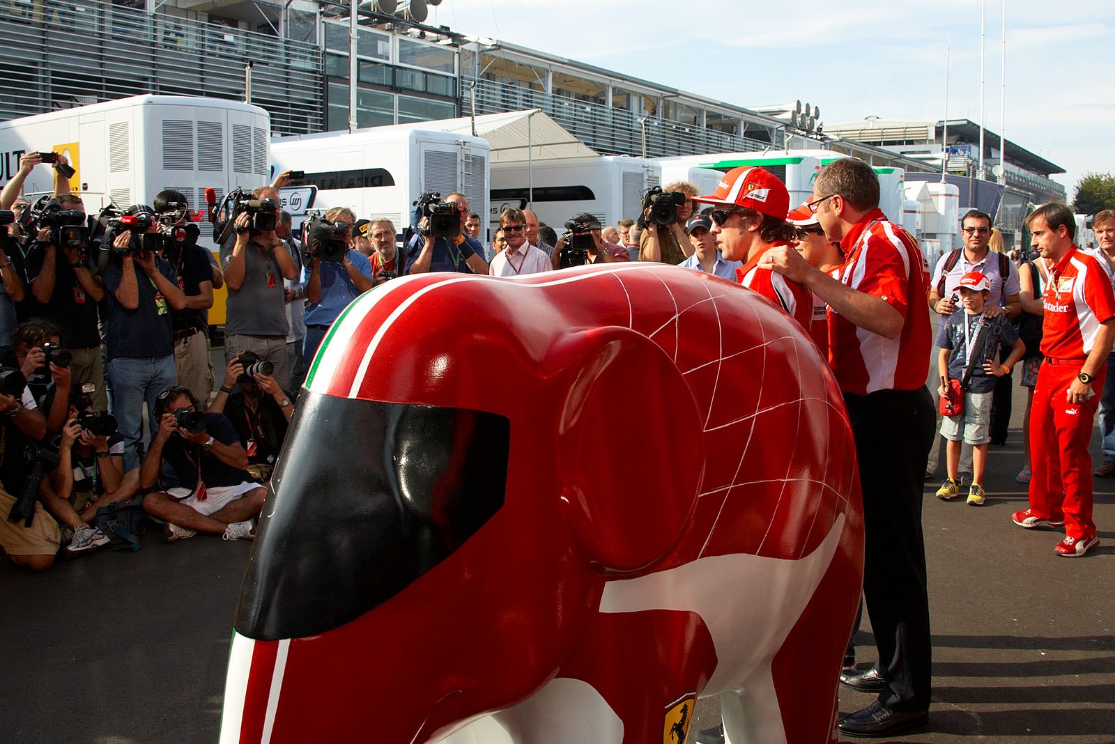 Ferrari team boss Stefano Domenicali and his drivers introduce the elephant 'Nello' as a new marketing instrument for charity purposes