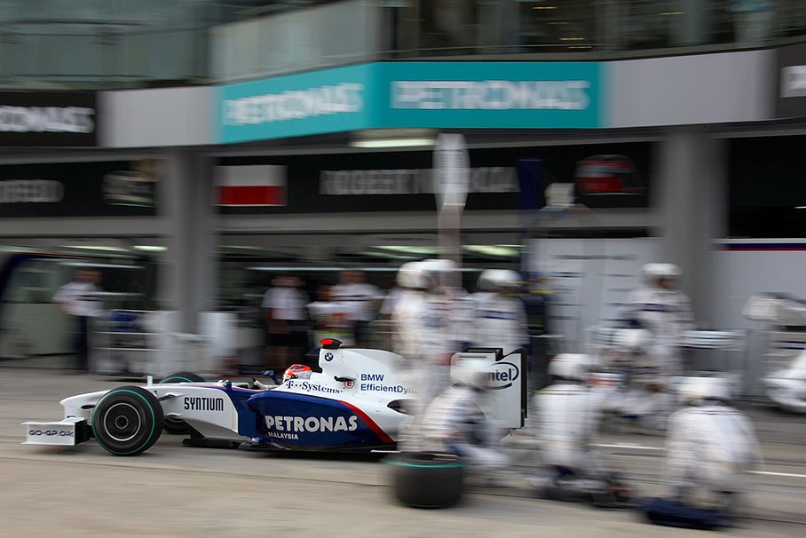 Robert Kubica shoots out of BMW Sauber F1 pits during Q3