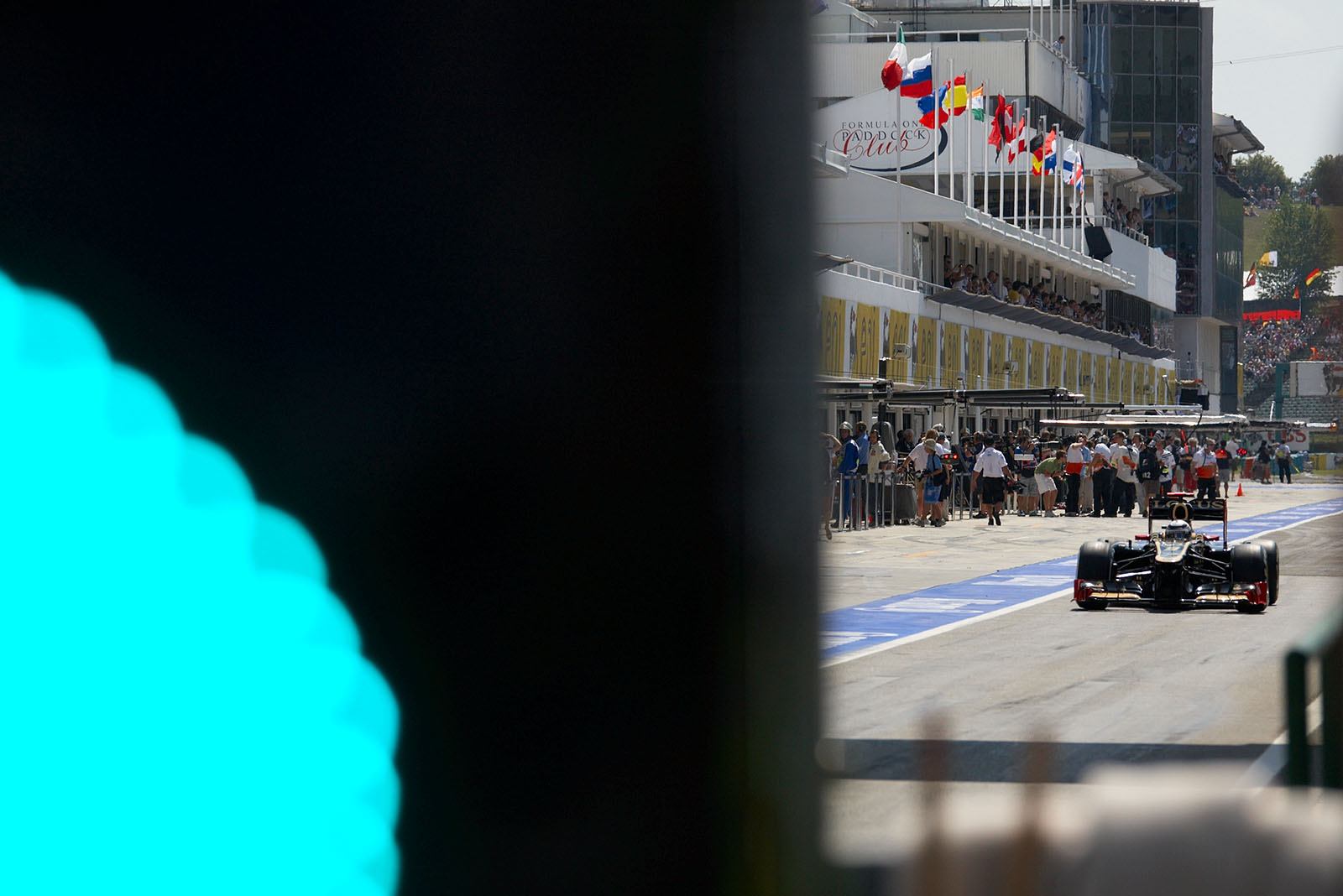 Green lights at pit lane exit for Kimi Raikkonen of Lotus F1 team