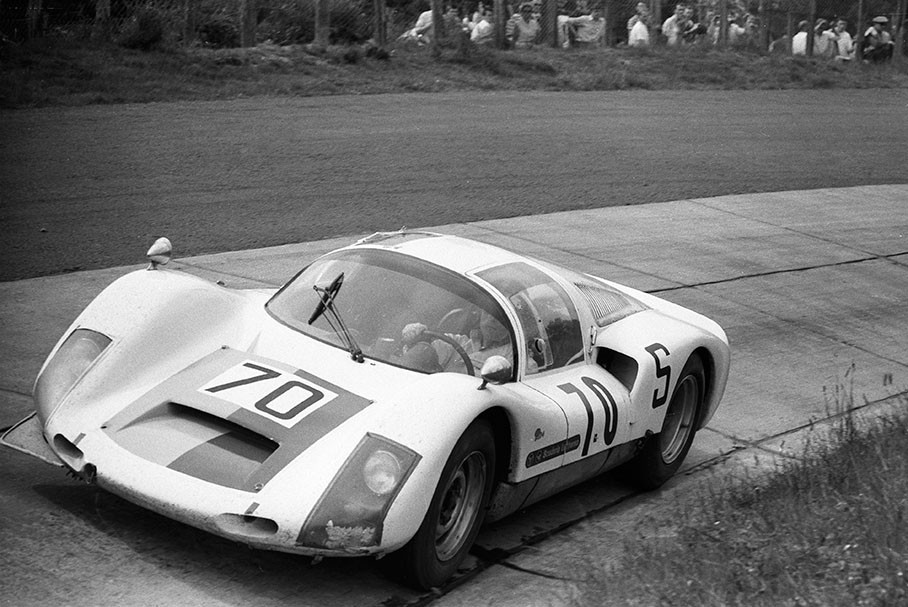Hans-Dieter Dechent (D) and Robert F. Huhn (D) drive the Porsche 906 of Scuderia Lufthansa to sixth place
