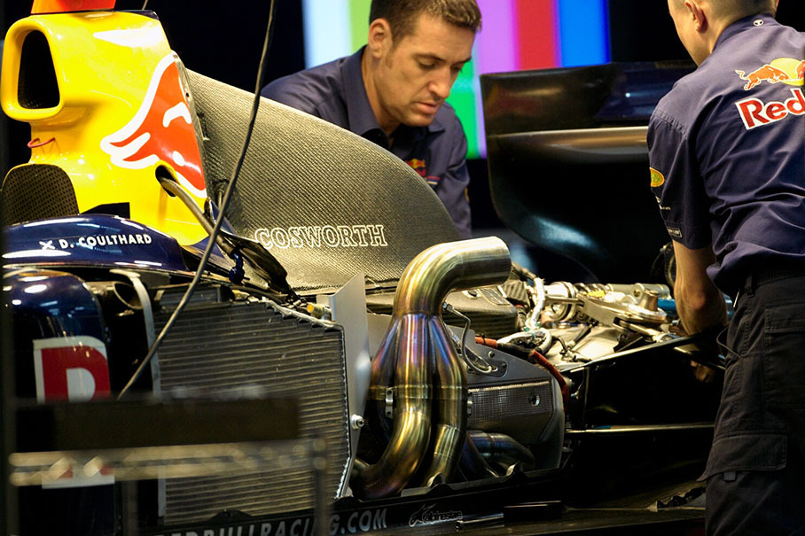 Red Bull engineers working on the Cosworth engine