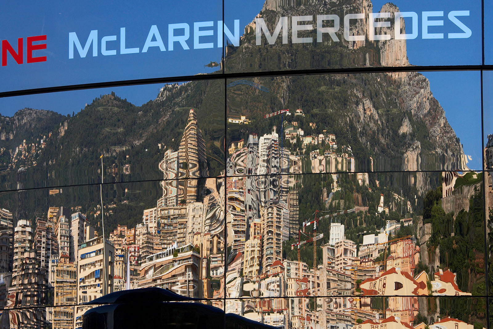 Monte Carlo reflections on McLaren's motor home.