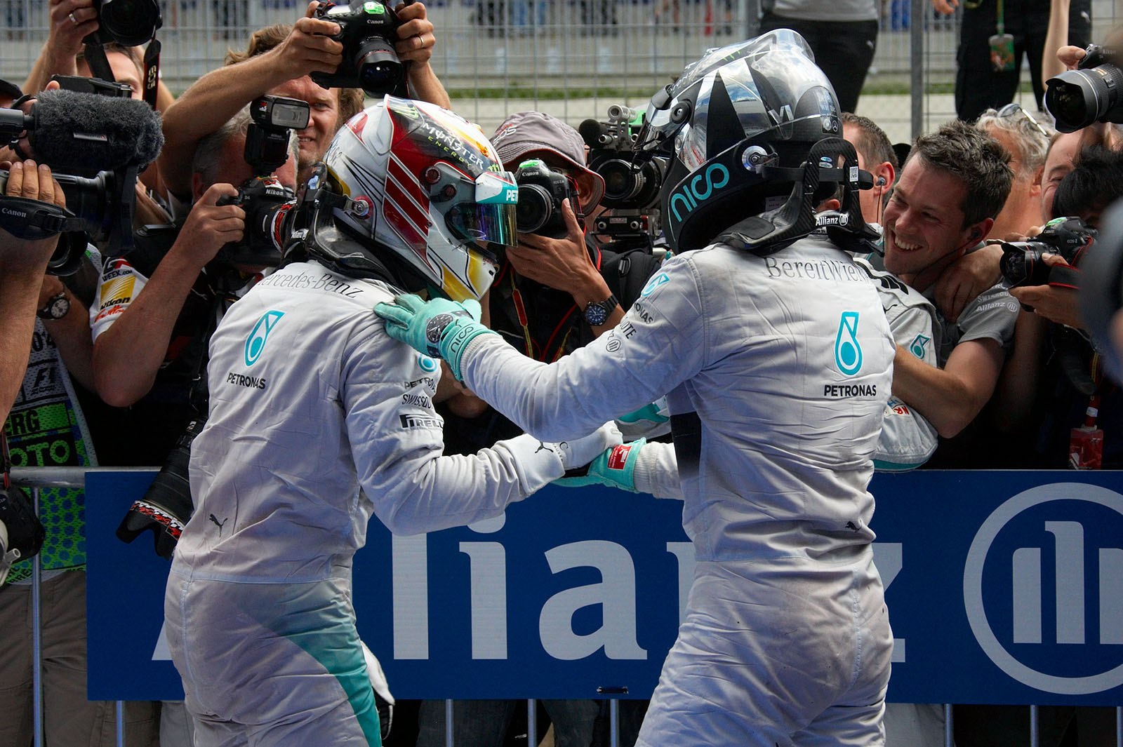 Role reversal of Bahrain earlier this season, as Lewis Hamilton and Nico Rosberg enjoy a spot of play fighting in parc ferme, Spielberg, Austrian Grand Prix, 2014