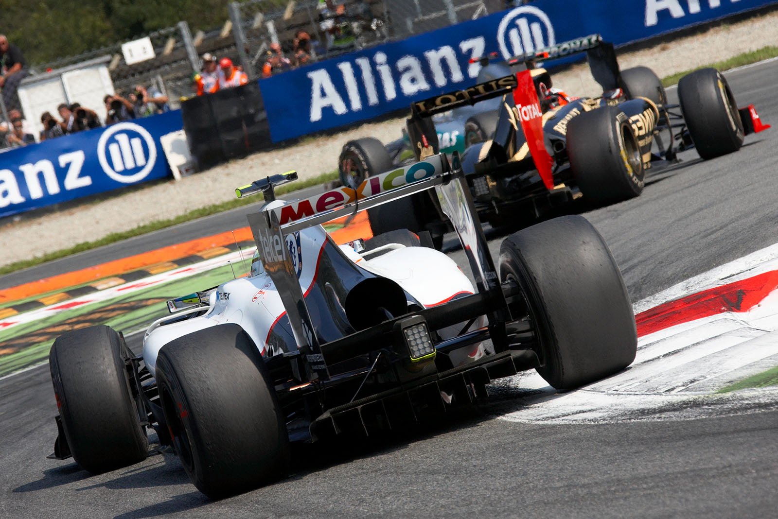 Sergio Perez, Sauber F1 Team, behind Raikkonen and Schumacher