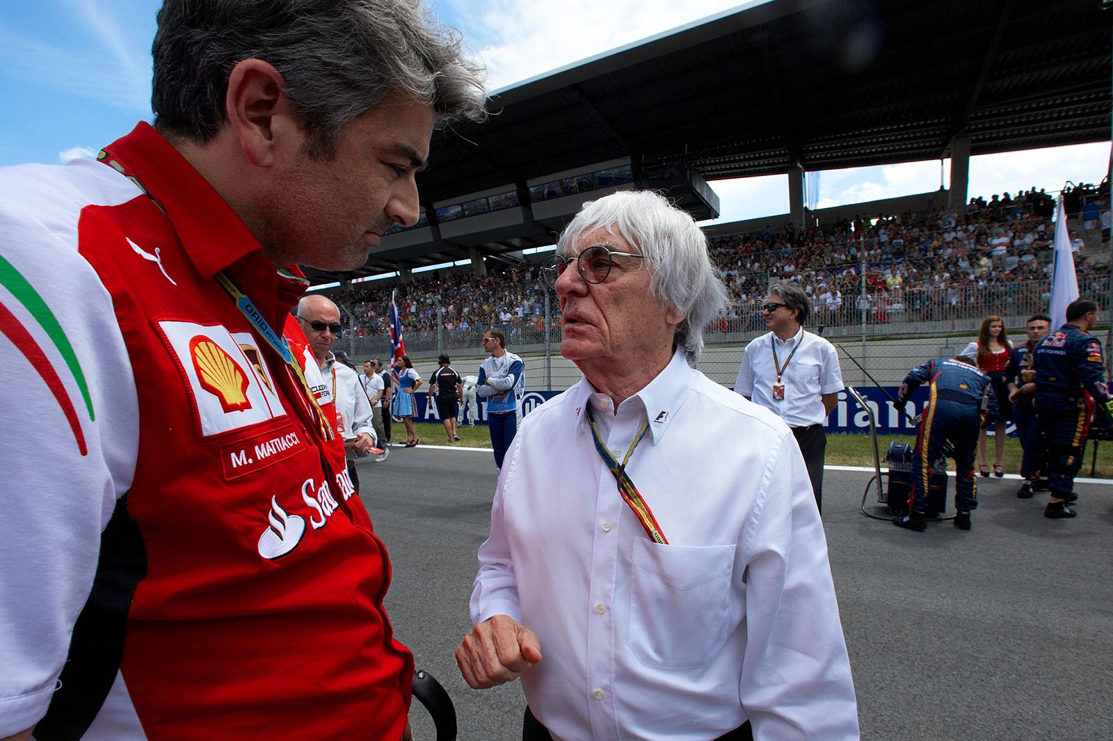 Ferrari's Marco Mattiacci and Bernie Ecclestone on the grid