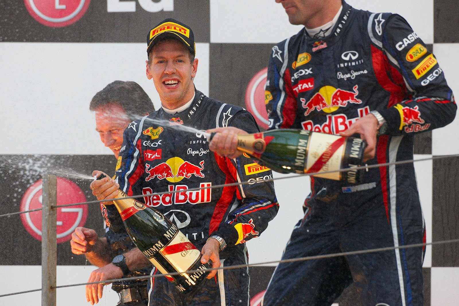 Champagne showers for the winning Red Bull team on the podium after the Korean GP