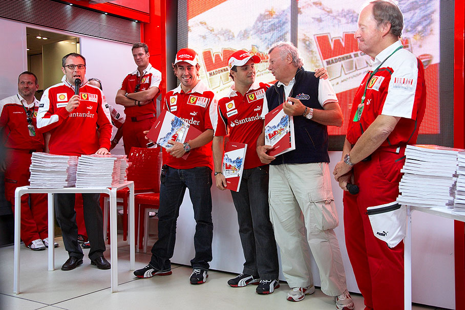 Ferrari team boss Stefano Domenicali celebrates the 20th anniversary of the Wrooom Press Meeting in the Ferrari media motorhome with Fernando Alonso, Felipe Massa, anniversary book publisher and Ferrari's official photographer Ercole Colombo and Nigel Wollheim