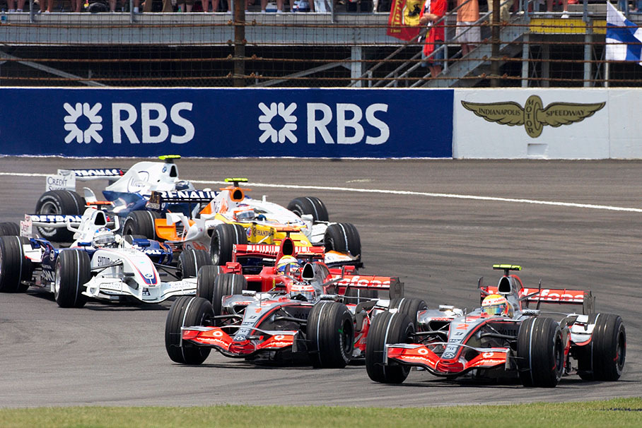 Start field at first corner, Lewis Hamilton in the lead
