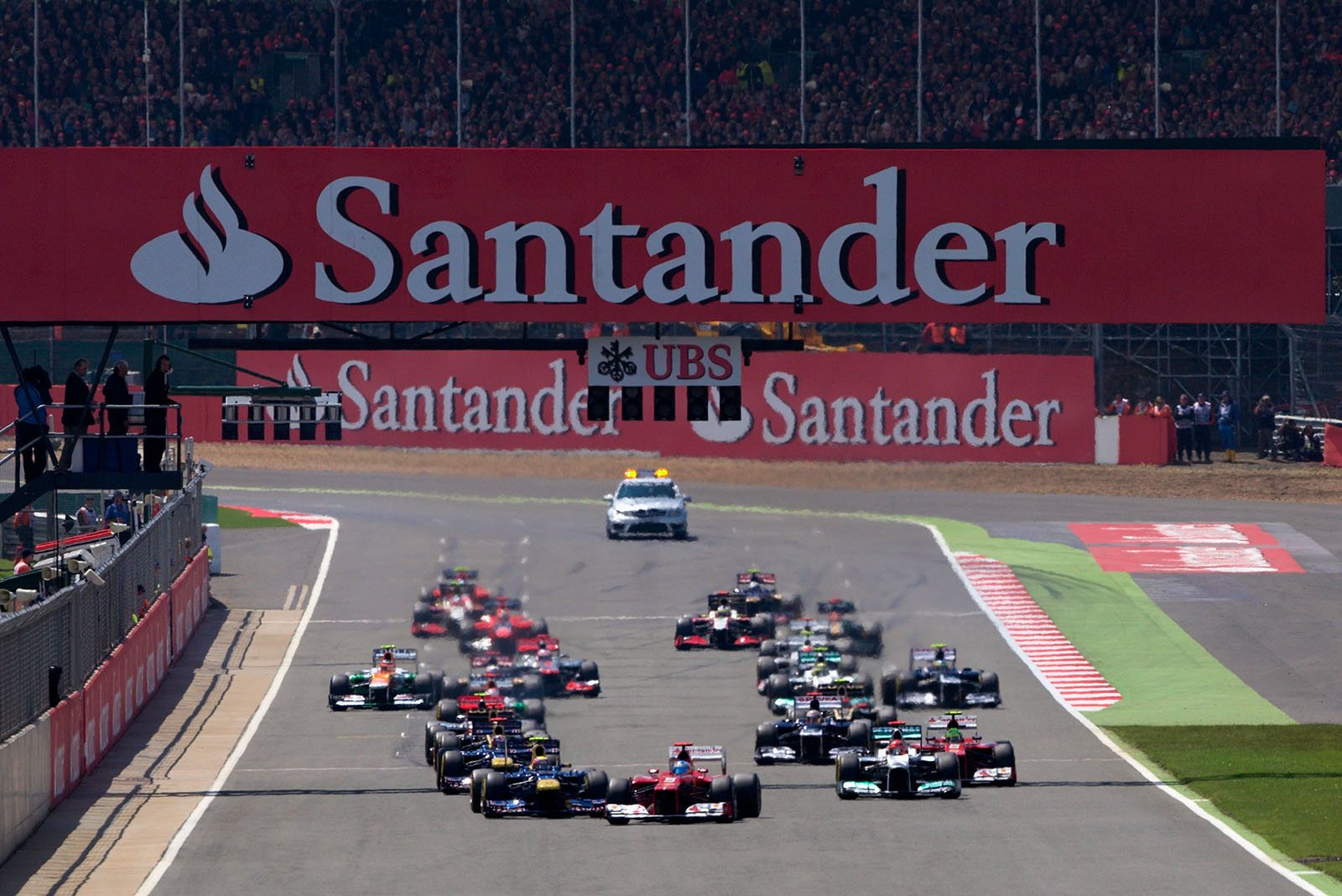 The start, Alonso's Ferrari in the lead with Webber behind him