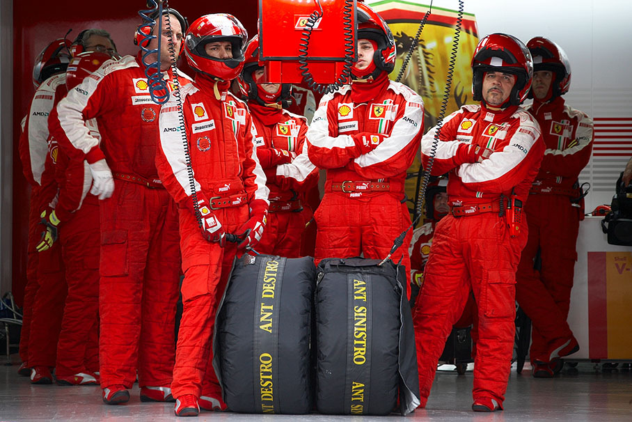 Ferrari mechanics in pits during qualifying