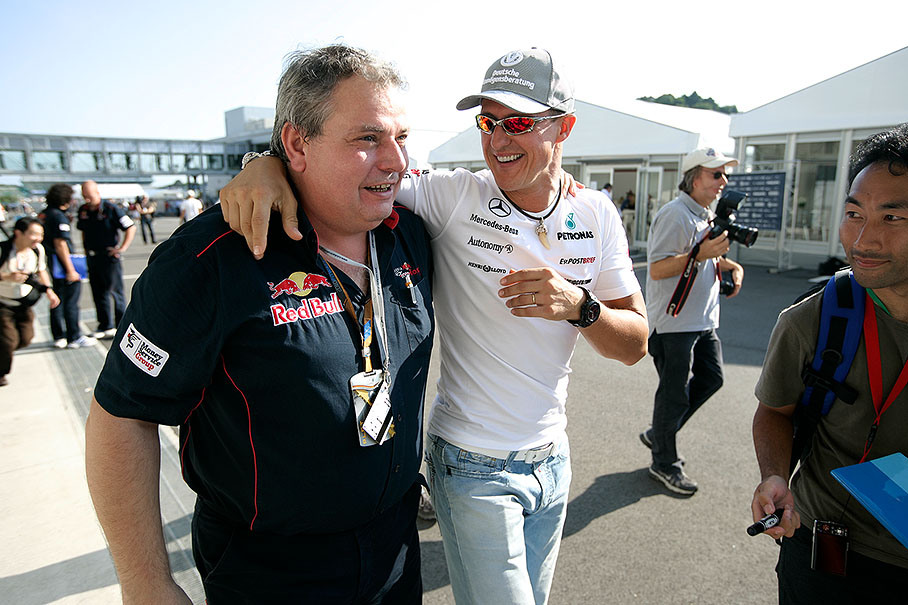 Toro Rosso’s technical director Giorgio Ascanelli with (his former driver at Benetton and Ferrari) Michael Schumacher of Mercedes