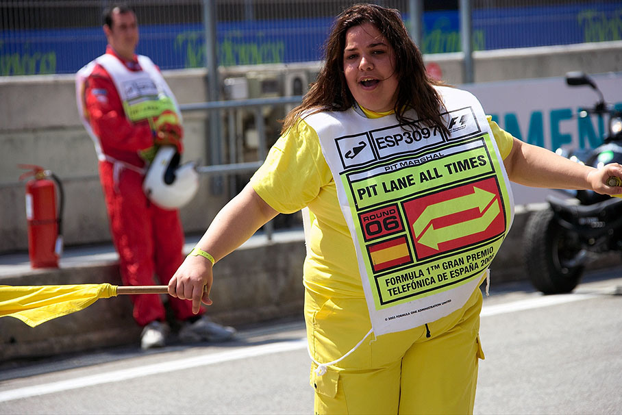 Voluntary female mashal showing motorsport enthusiasm