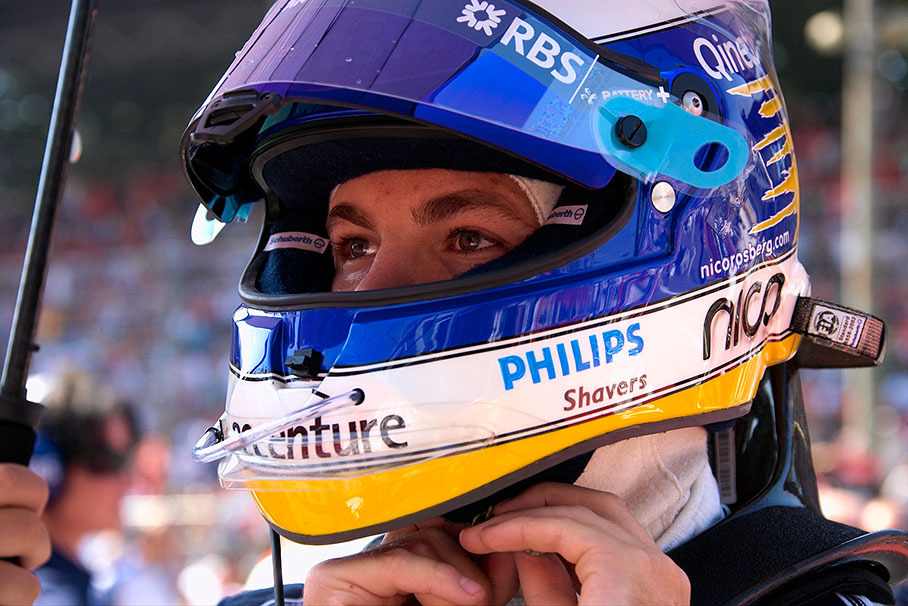 Nico Rosberg puts his helmet on