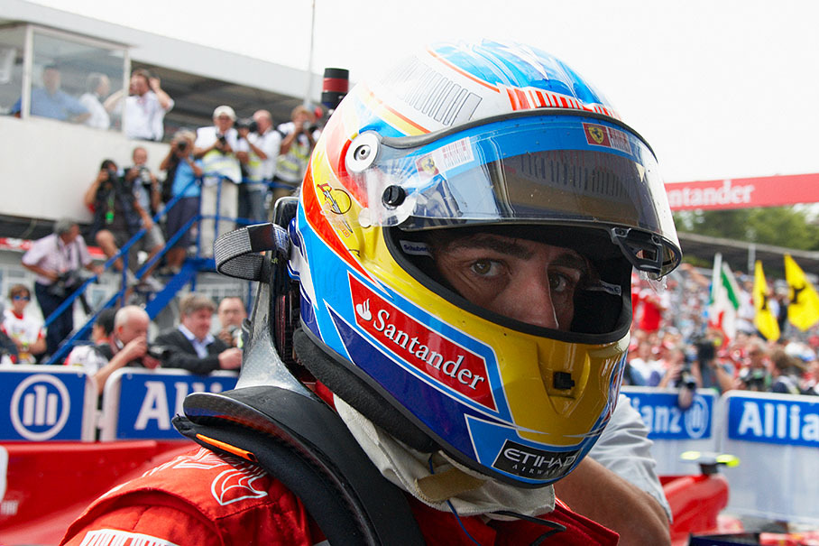 Race winner Alonso leaves parc ferme after a controversial Hockenheim win