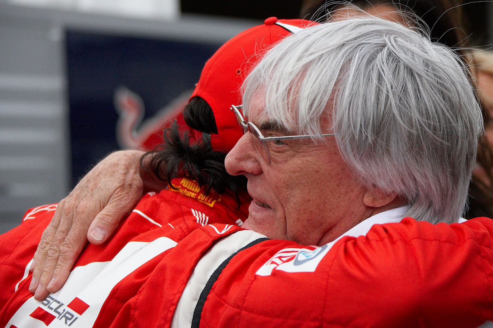 Felipe Massa caresses Bernie Ecclestone