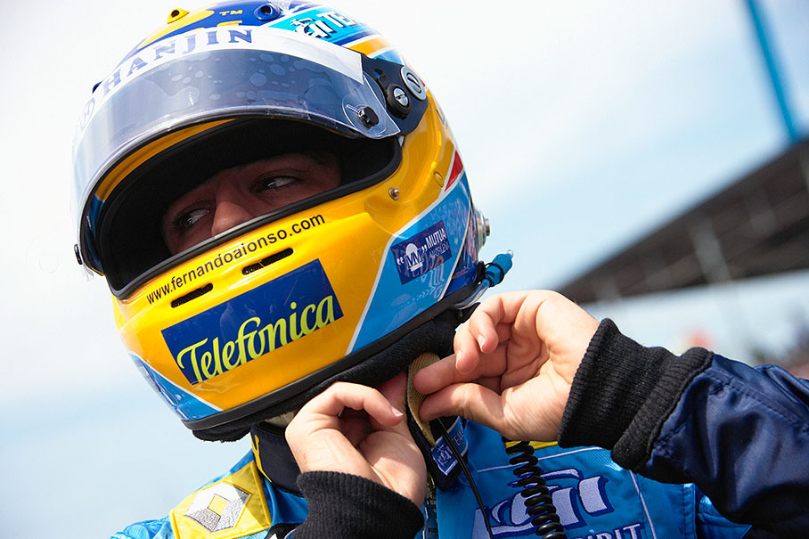 Fernando Alonso preparing to take a seat