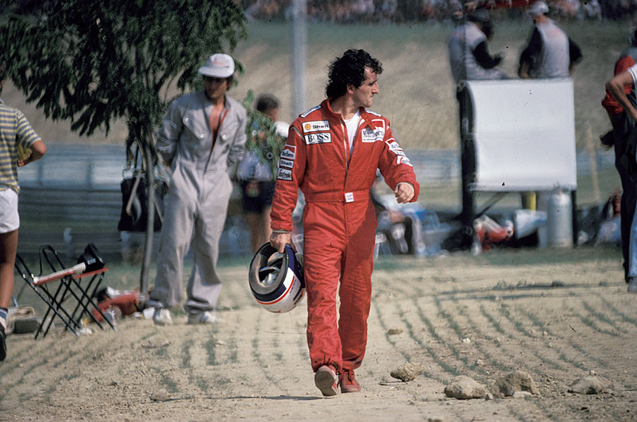 Alain Prost retires after 23 laps with suspension problems on his McLaren-TAG Porsche