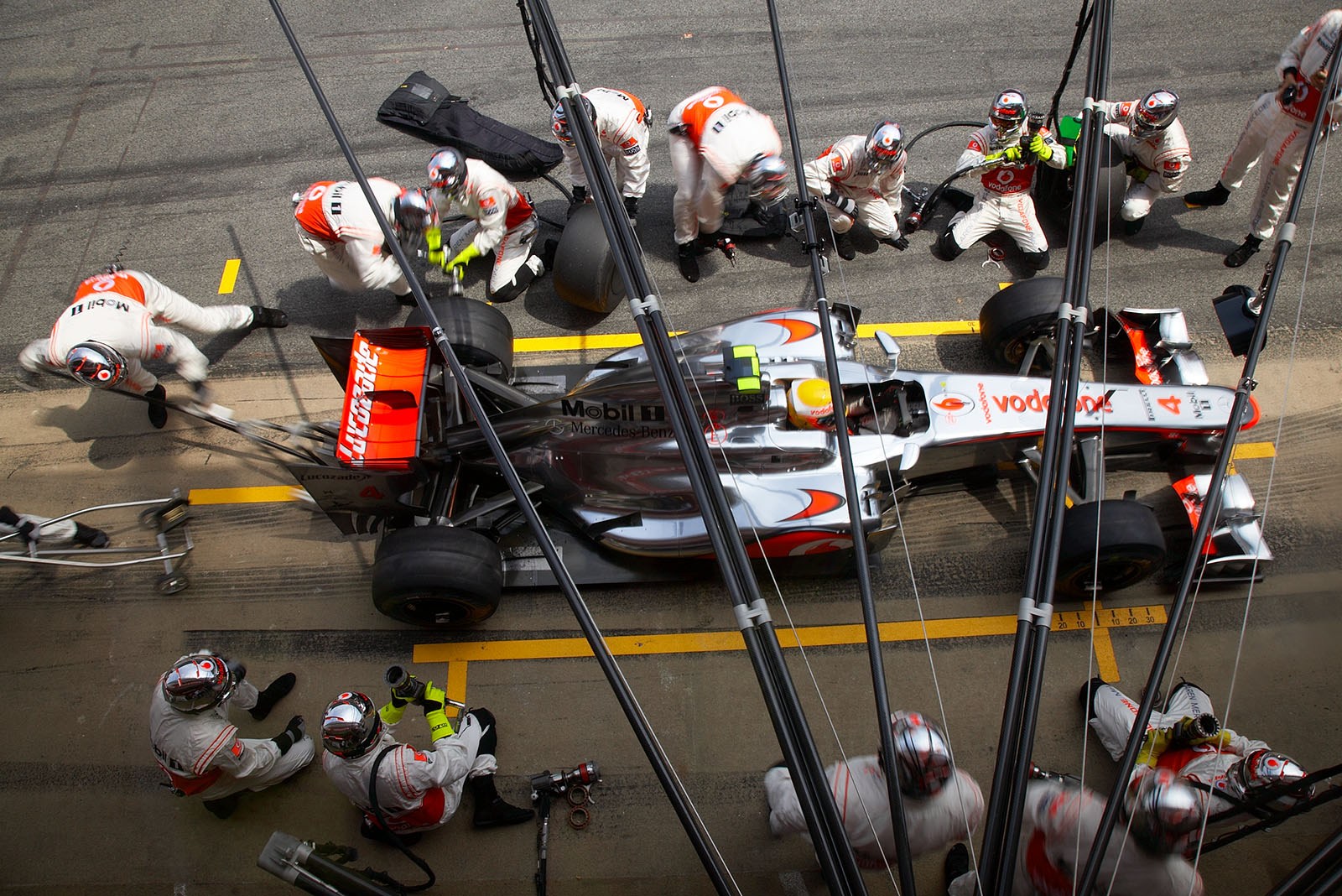 Pit stop from above of Lewis Hamilton at McLaren pits