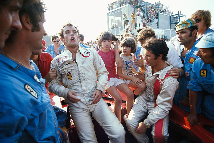 Jacky Ickx and Mario Andretti celebrate their victory amidst the fans after the Can-Am race in Watkins Glen 1972