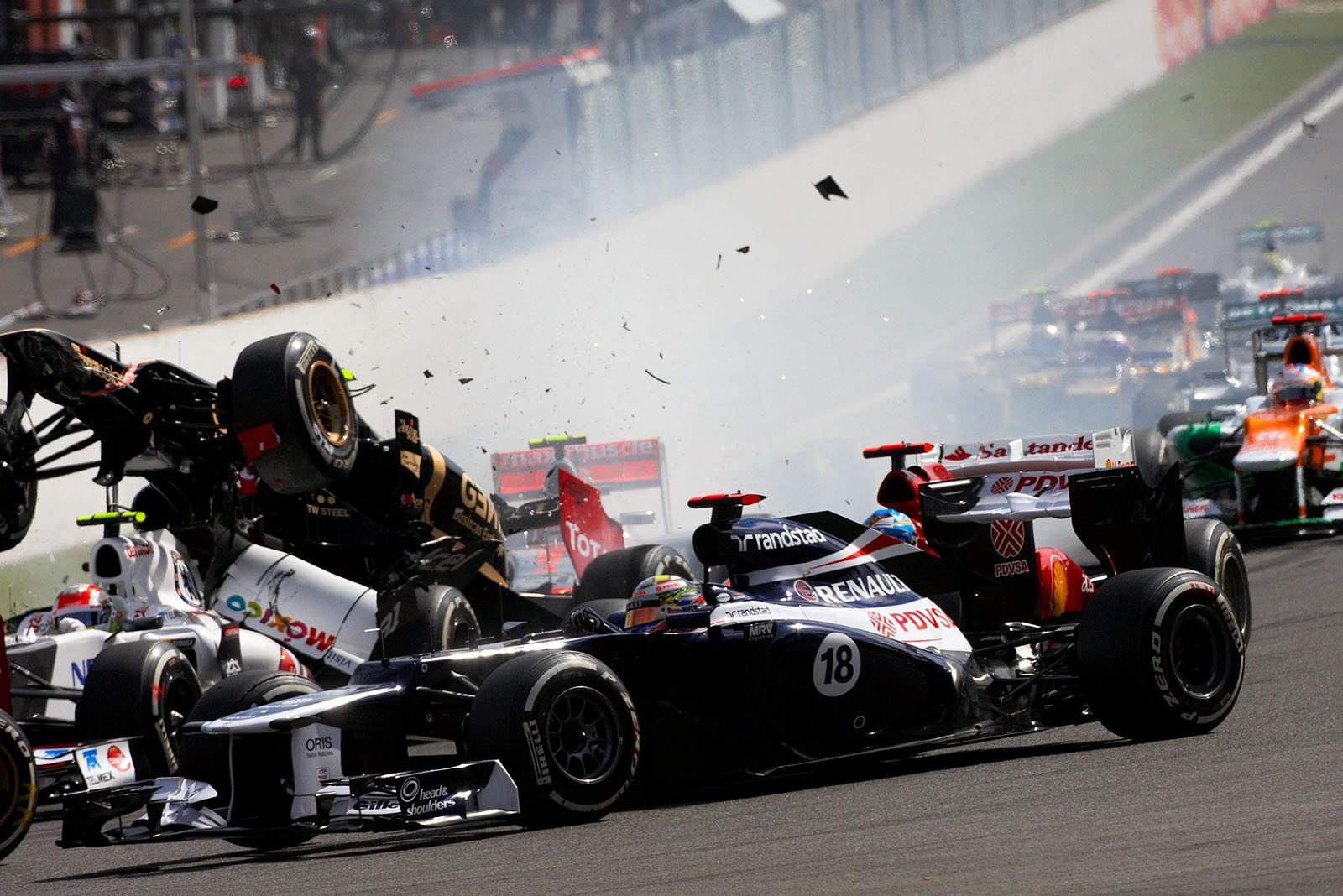 At the start of the Belgian Grand Prix 2012, the start field approaches turn one whilst Grosjean causes the start accident
