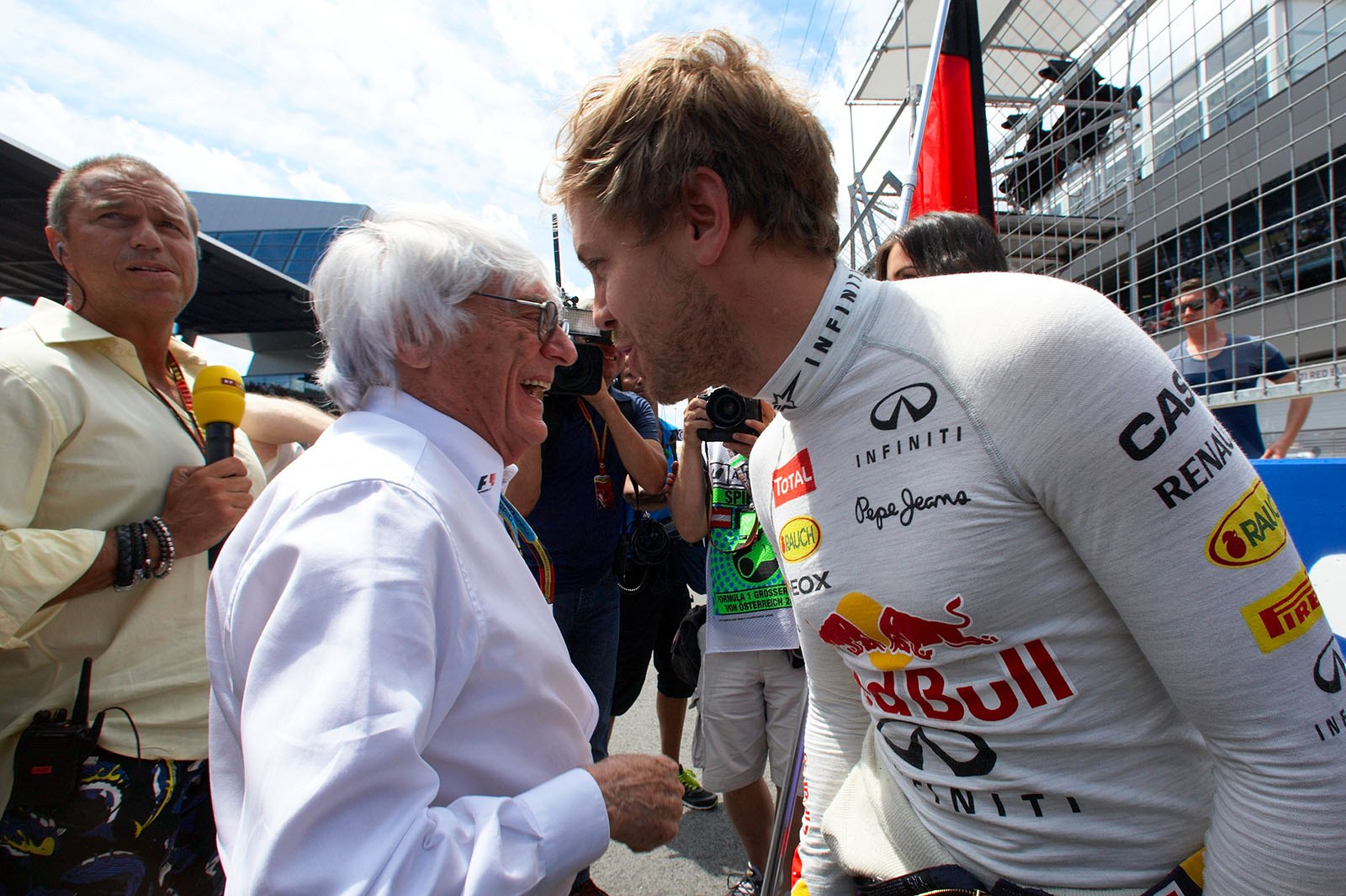 Bernie Ecclestone joking with Sebastian Vettel on the grid, Spielberg, Austrian Grand Prix, 2014