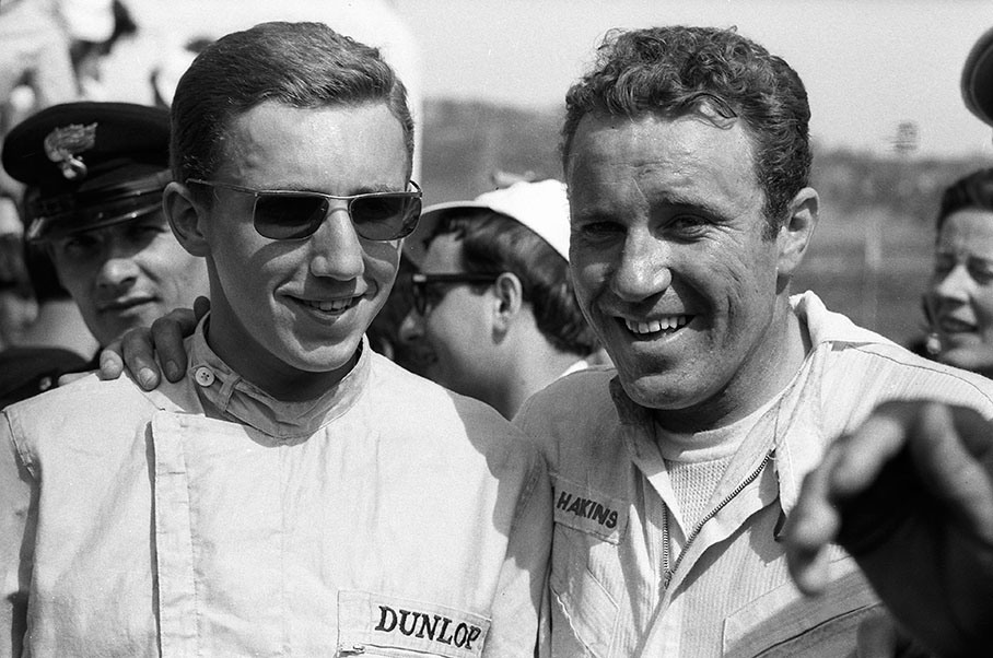 The winning Porsche driver team Rolf Stommelen and Paul Hawkins pose together