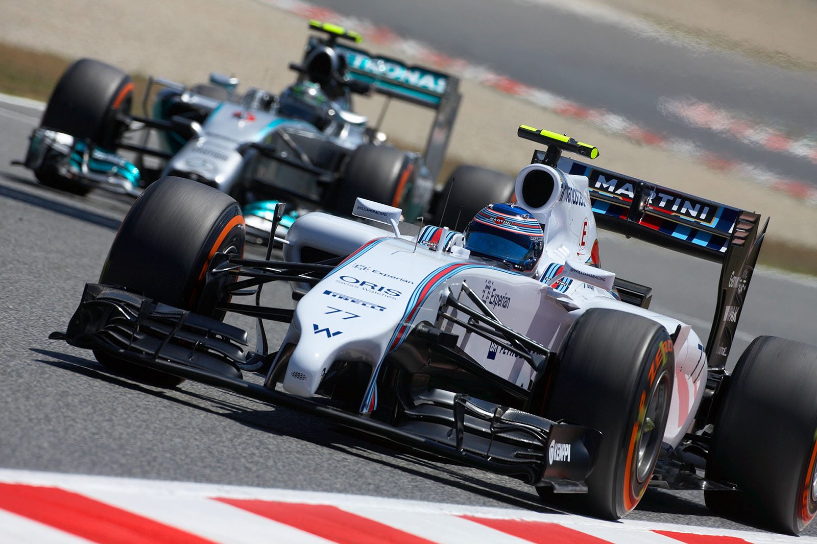 Valtterii Bottas, Williams, in front of Rosberg's Mercedes