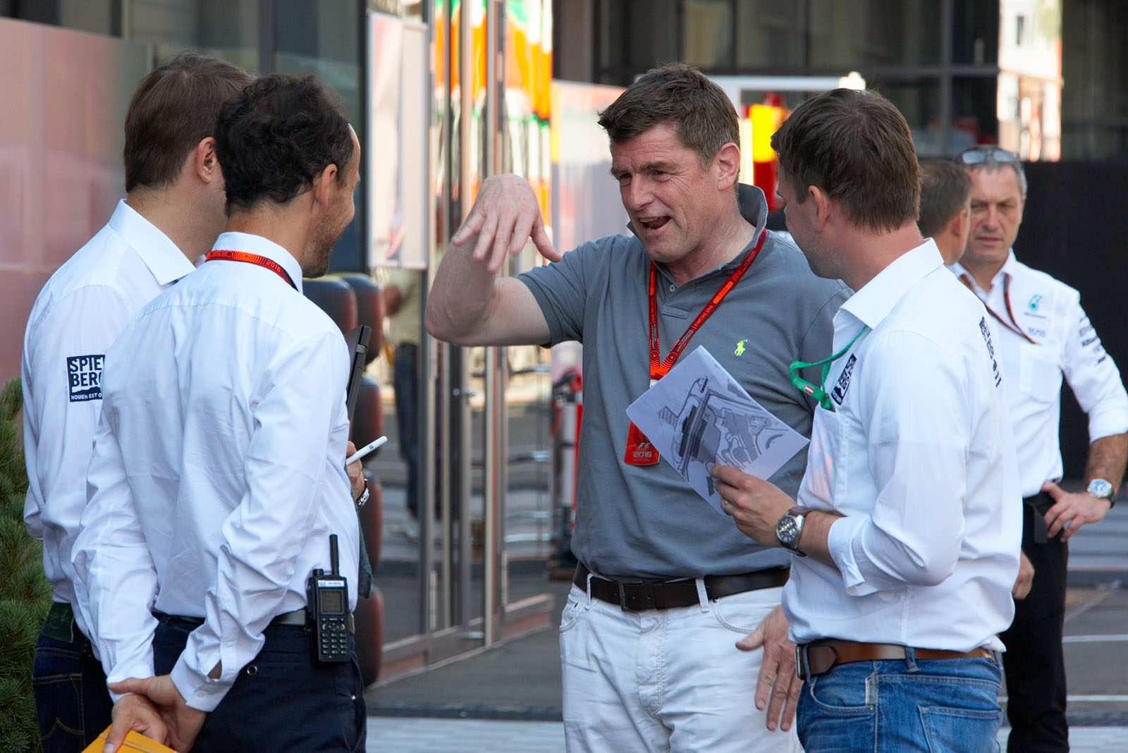 Thomas Ueberall with Spielberg staff in paddock, Austrian Grand Prix, 2016