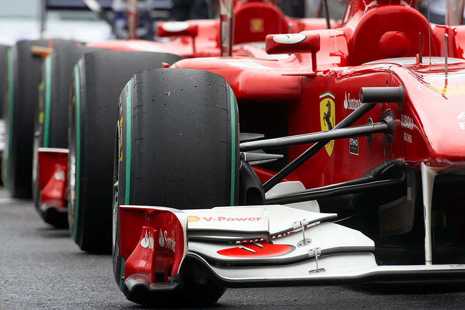Slick tyres on the Ferrari cars in parc ferme