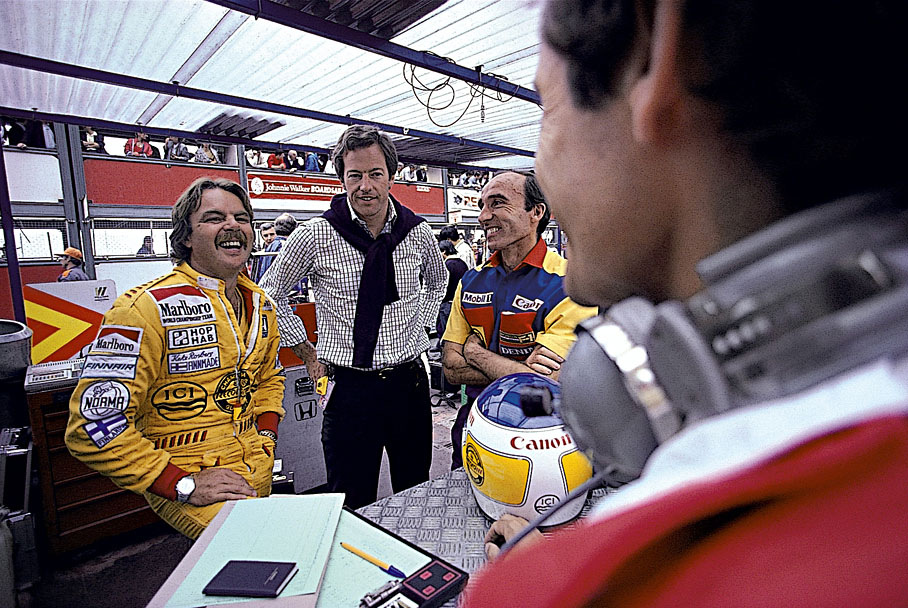 Williams-Honda driver Keke Rosberg with Mark Thatcher (Margaret Thatcher's son) and Frank Williams.