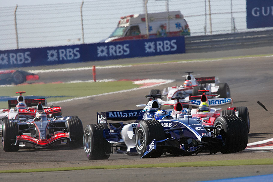 Nico Rosberg with a front wing falling off