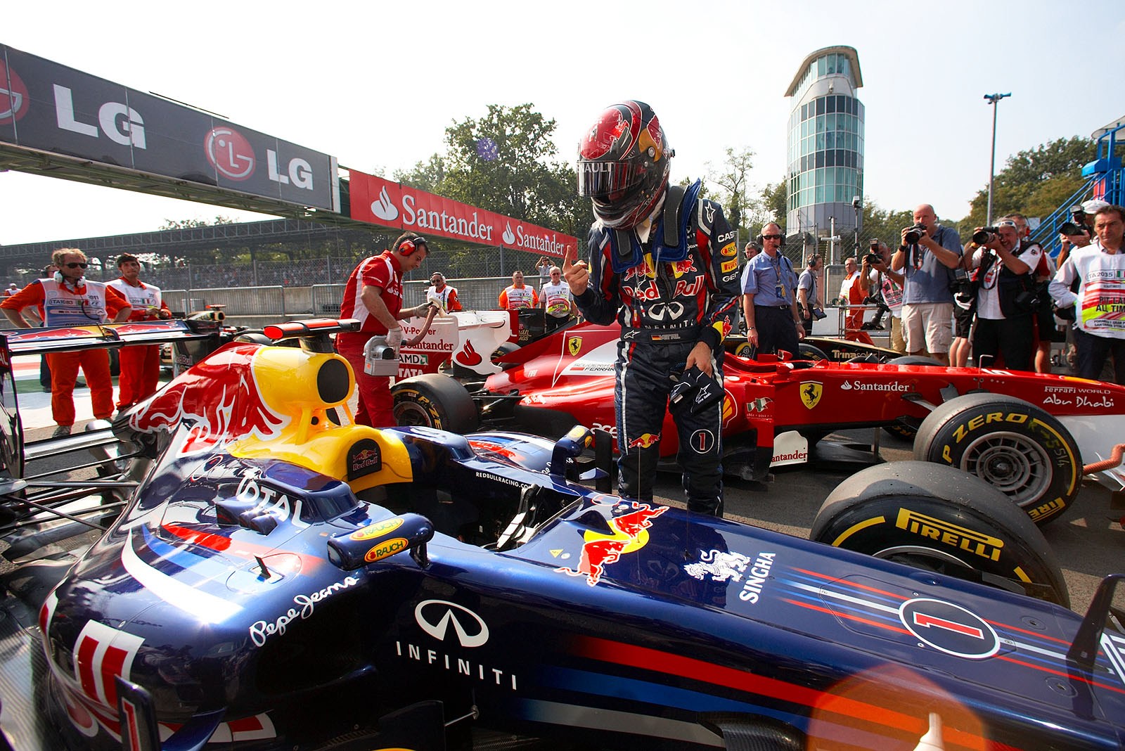Sebastian Vettel, Red Bull Racing, gains pole position in Monza and celebrates after qualifying in parc ferme