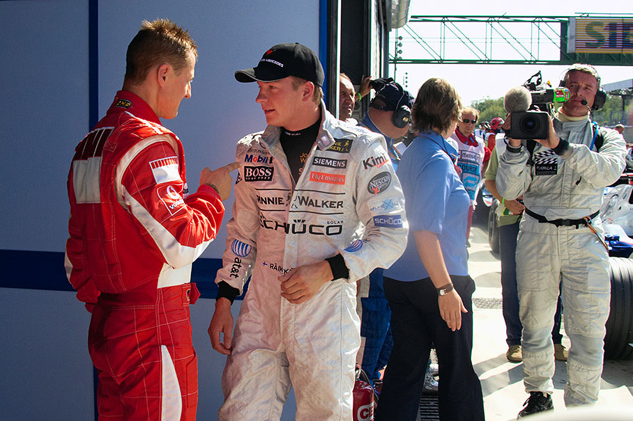 Michael Schumacher and Kimi Raikkonen in Saturday's parc fermÈ