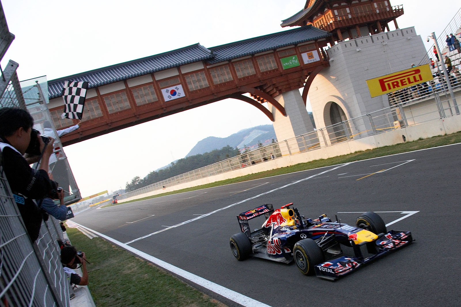 Unbeatable double World Champion Sebastian Vettel, Red Bull Racing, takes the chequered flag to win the Korean Grand Prix