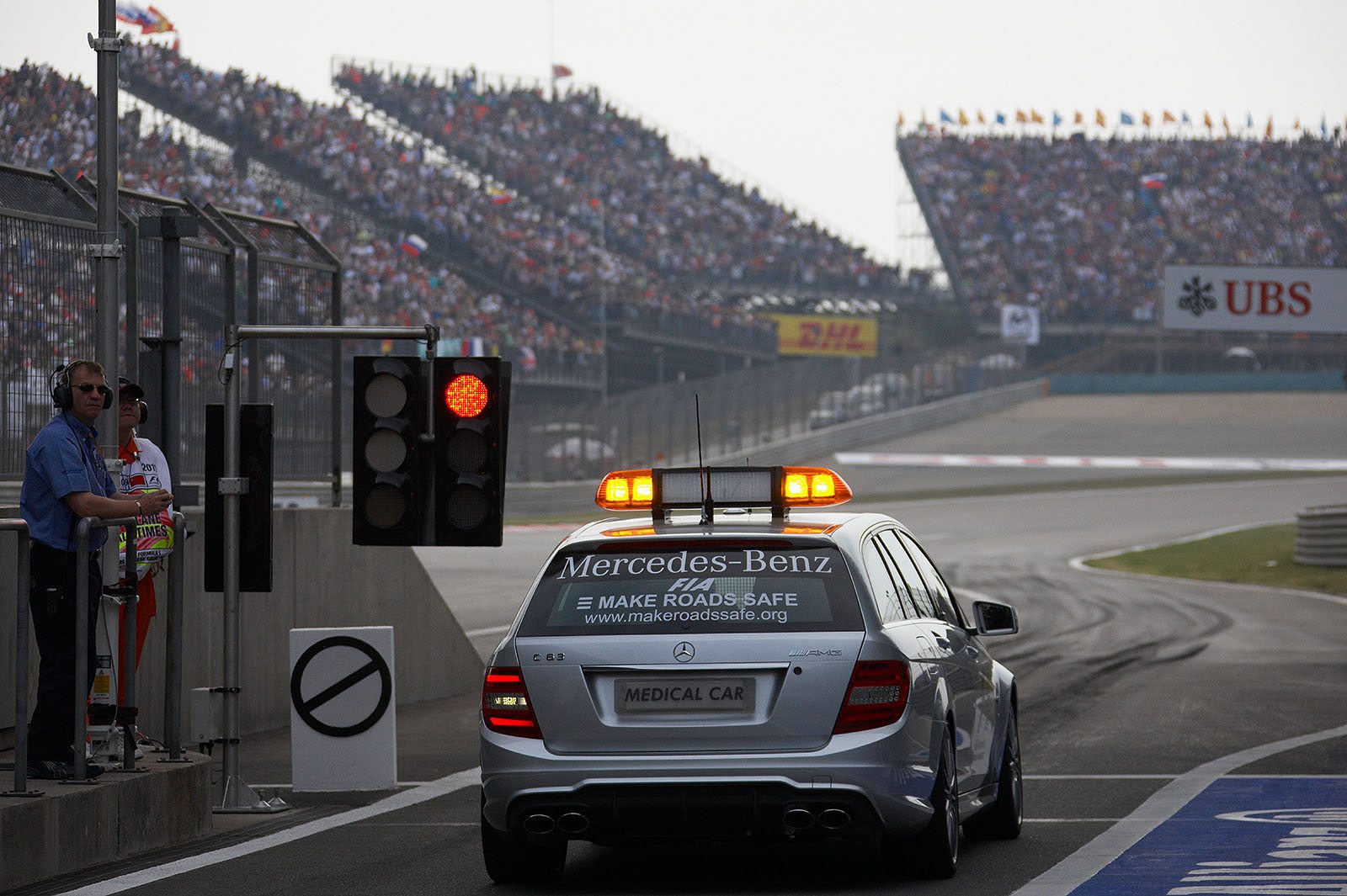 The medical car waits for the start at the end of the pit lane