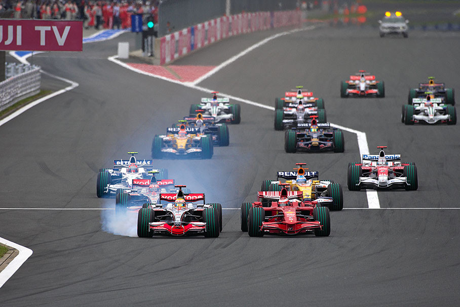 Leading the start field after overtaking Raikkonen, Hamilton brakes too late into first corner