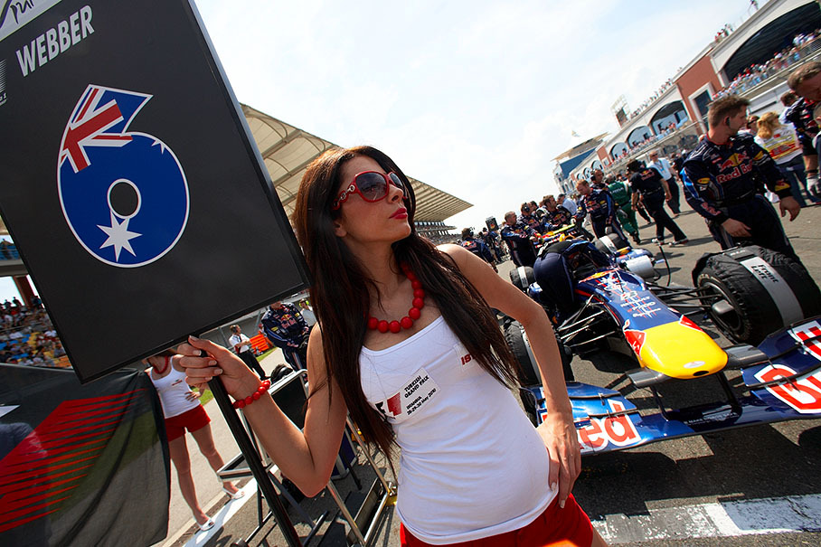 Mark Webber's car on pole position, guarded by a Turkish grid girl