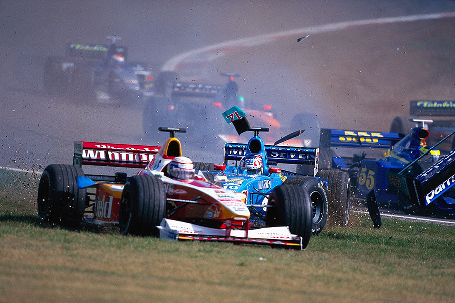 Benetton driver Alex Wurz retires trapped in the start accident, Williams driver Alessandro Zanardi (in foreground)manages to sidestep