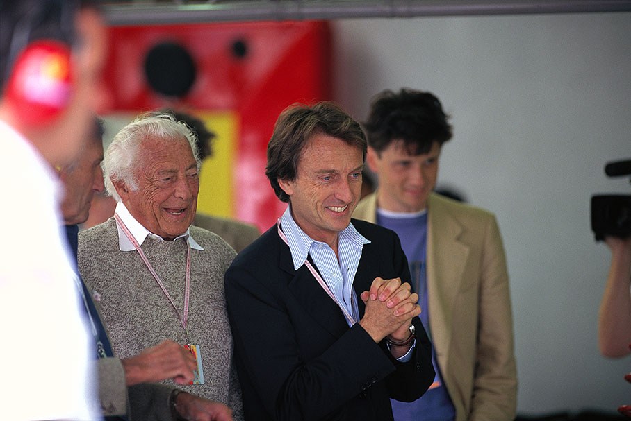 Luca Cordero di Montezemolo and Gianni Agnelli watch qualification in pits
