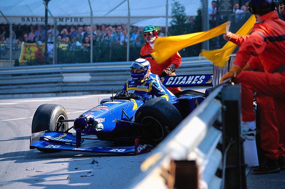 Olivier Panis crashes his Ligier-Mugen Honda JS41 in lap 65 opposite Cafe de Paris