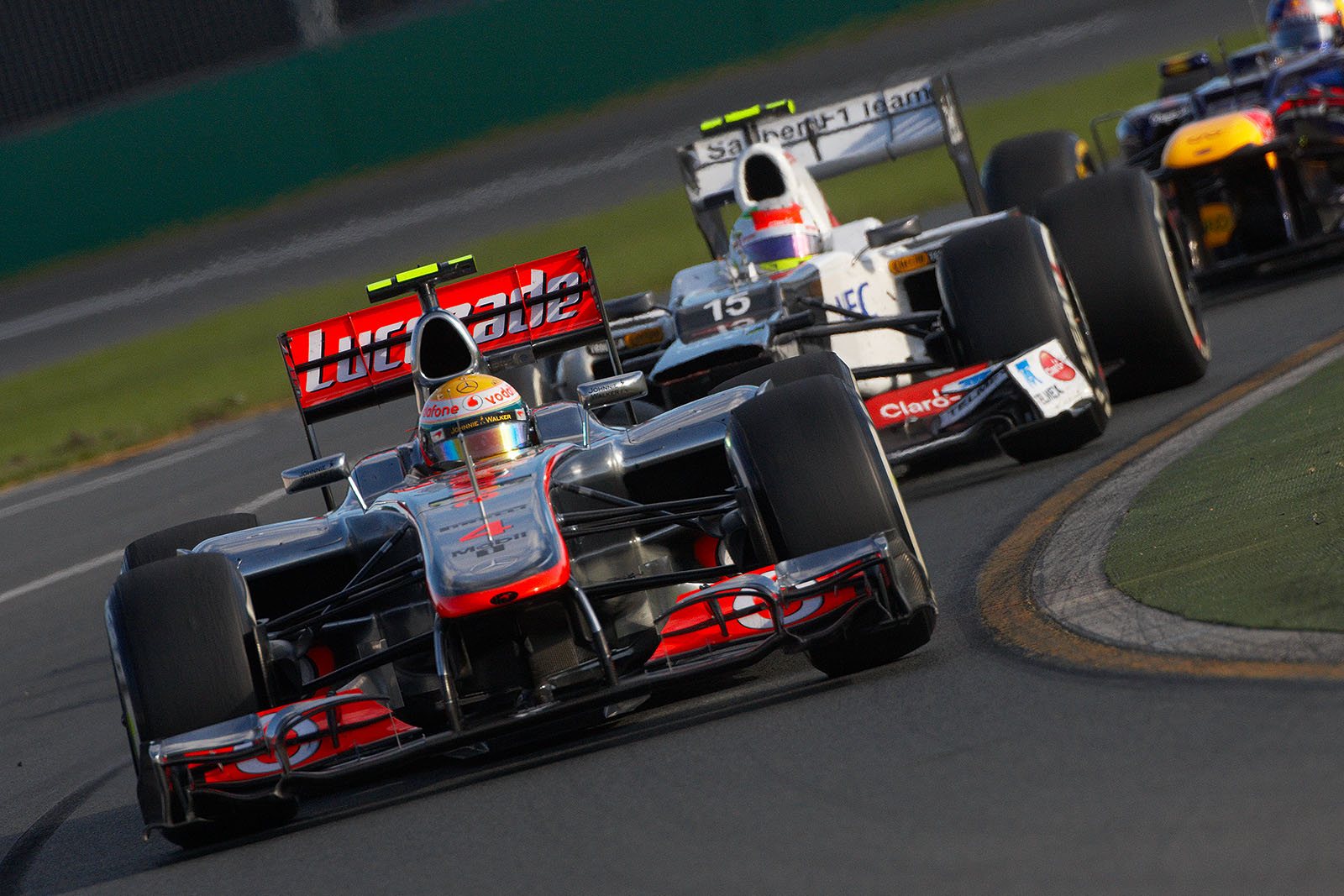 Lewis Hamilton, McLaren Mercedes, in front of Perez and Vettel