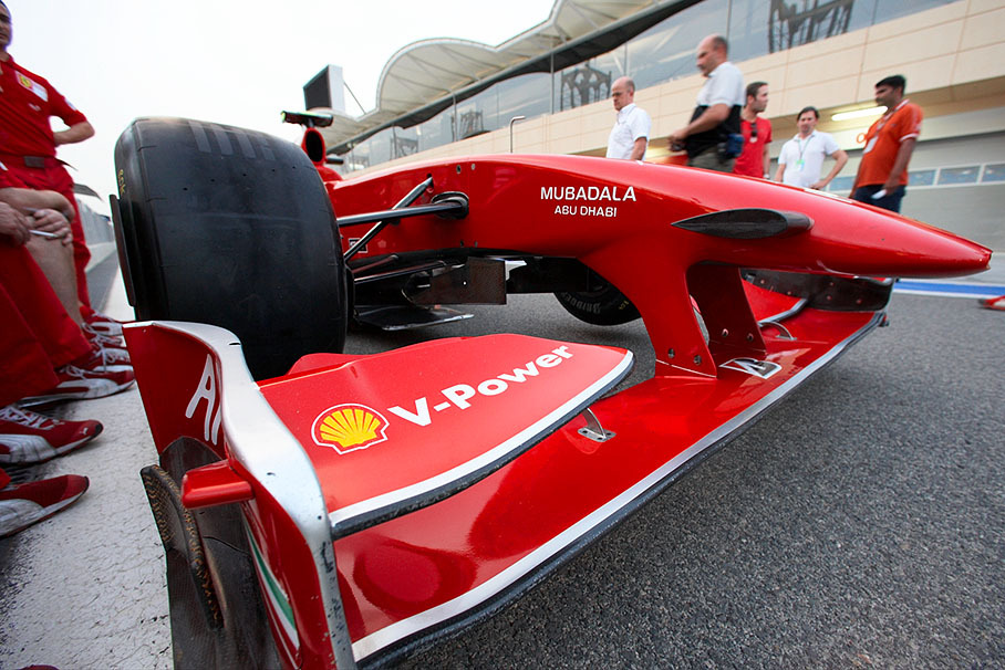 A Ferrari waits in pitlane for FIA scrutineering