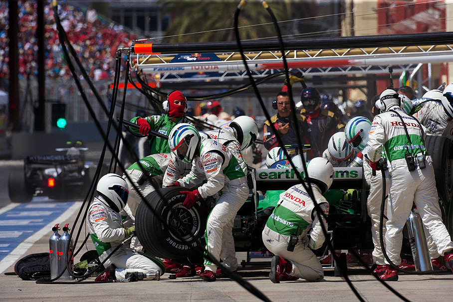 Rubens Barrichello is being serviced at Honda pits